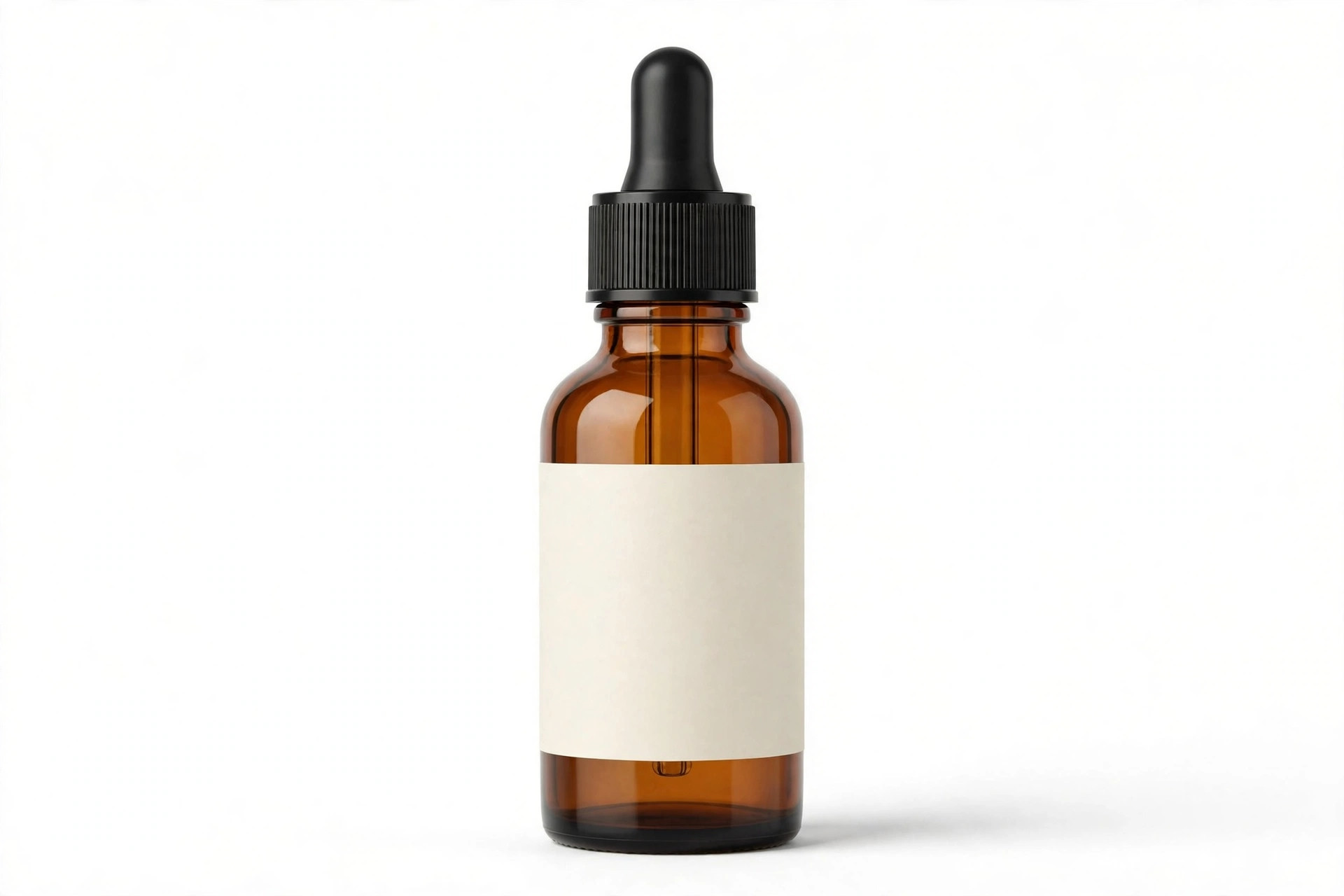 Blank amber dropper bottle with an empty label, ready for your private label design